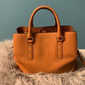Kate Spade bag. Has strap to wear as crossbody